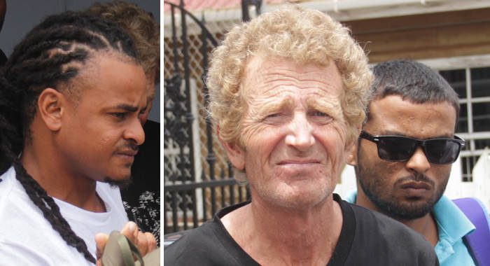 From left: Kenroy Edwards, of Rose Bank, Kevin Slauter, of England, and Javid Chetram, of Grenada, leave the Kingstown Magistrate’s Court on Friday. (iWN photo)