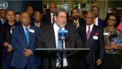 Prime Minister Ralph Gonsalves, speaks to the media at the United Nation last week as members of his delegation and staff at  SVG's UN Mission look on.