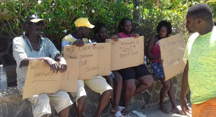 Persons protest, demanding a secondary school in Canouan.