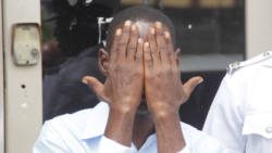 Security guard Lincoln Small exits the Kingstown Magistrate's Court after the proceedings on Monday. (iWN photo)