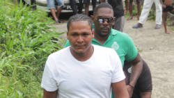 Jason Isaacs in police custody in Mahaut on July 27, 2019. (iWN photo) 