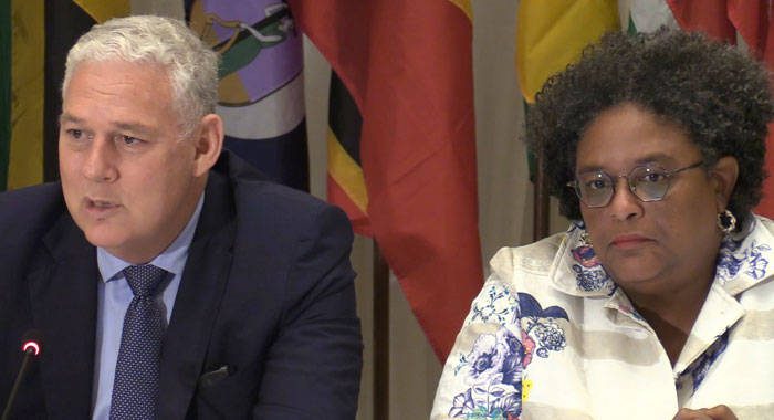 Prime Minister Allen Chastanet, left, and Mia Mottley speaking at the press conference in Castries Friday night. (iWN photo)
