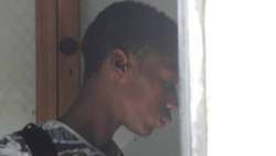 Rashad Anderson, 16, one of the teens, leaves the Serious Offences COurt on Monday, after his arraignment. (iWN photo)