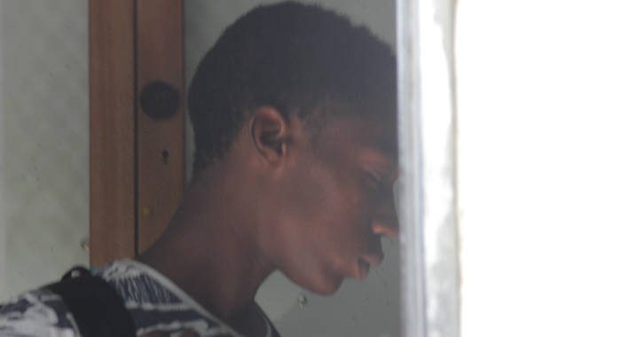 Rashad Anderson, 16, one of the teens, leaves the Serious Offences COurt on Monday, after his arraignment. (iWN photo)