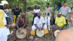 Garifuna sing and drum in August 2019 during a visit to Balliceaux, the Grenadine Island to which their forebears were taken before their exile to Central America in the late 18th century. 