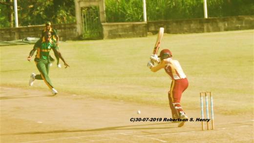 Jamie Buddy and the Leeward opening batsmen in battle. (Photo: Robertson S. Henry)