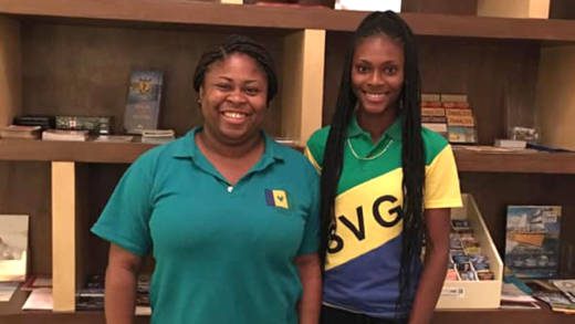 Mentor Kashka King, left, with Youth Ambassador Nikita Williams of St. Vincent and the Grenadines prior to their departure.