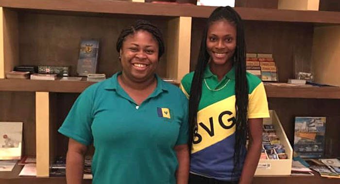 Mentor Kashka King, left, with Youth Ambassador Nikita Williams of St. Vincent and the Grenadines prior to their departure.