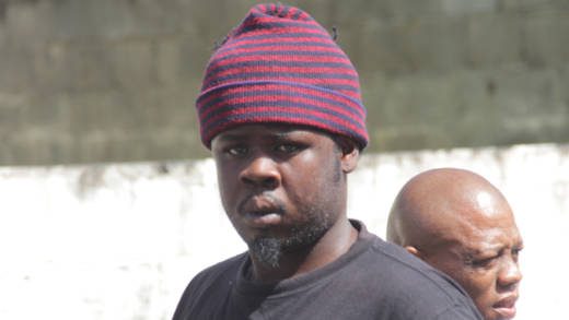 Accused murderer, Keshurn Sayers is escorted to court on Tuesday. (iWN photo)