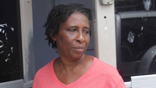 Marian Ghent leaves the Kingstown Magistrate's Court on Tuesday after being bonded for wounding her ex-lover. (iWN photo)