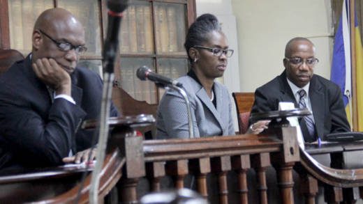 From left: High Court judges, Justices Brian Cottle and Esco Henry along with Master Rickie Burnett at the bench ahead of the start of Tuesday's simulcast. Justice Nicola Byer, who was also at the bench, is not captured in the photograph. (iWN photo)