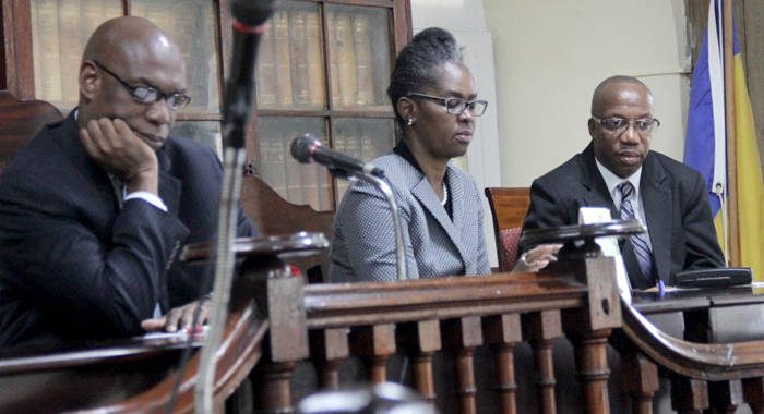 From left: High Court judges, Justices Brian Cottle and Esco Henry along with Master Rickie Burnett at the bench ahead of the start of Tuesday's simulcast. Justice Nicola Byer, who was also at the bench, is not captured in the photograph. (iWN photo)