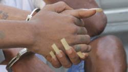 Jebarry Jackson's hands, showing the long fingernails. (iWN photo)