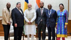 Prime Minister Ralph Gonsalves, second left, his Indian counterpart, Narendra Modi and other members of Gonsalves' delegation.
