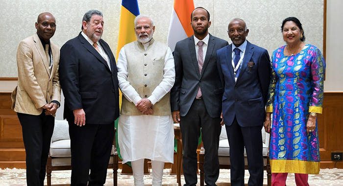 Prime Minister Ralph Gonsalves, second left, his Indian counterpart, Narendra Modi and other members of Gonsalves' delegation.
