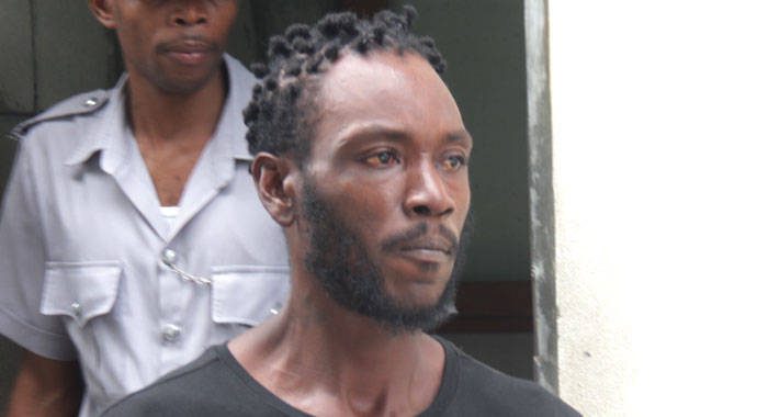 Accused rapist Alex Thomas is escorted to prison on Friday after failing to secure a surety by the time court was adjourned for the day. (iWN photo)