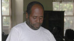 The accused, Delroy Quashie leaves the High Court after his arraignment. (iWN photo)