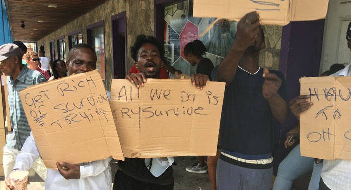 The displaced vendors demonstrate in Kingstown on Friday morning. (iWN photo)