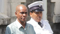 Ernie Jackson is escorted to prison to serve his 18.5-year sentence. (iWN photo)