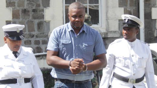 Levorn Williams is escorted to prison on Friday. (iWN photo)