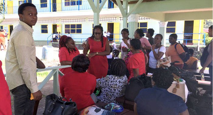 President of the SVG Teacher Union, Wendy Bynoe speaks with teachers at the Questelles Government School on Monday. (iWN photo)