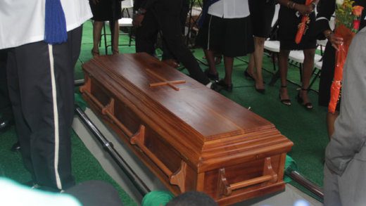 The beautifully constructed breadfruit board casket was built, in keeping with Sir Frederick’s wishes, by his long-time friend, Oscar Cadogan, a carpenter, and the joiner’s son, Clous Cadogan. The Rose Place artisans used breadfruit wood that had been cured for 15 years. (iWN photo)