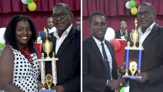 Police Sportswoman of the Year, Corporal of Police Sylvorne Oliver, left, and Sportsman of the Year Constable Desron Maloney receive their prizes from Coast Guard commander Brenton Cain. 