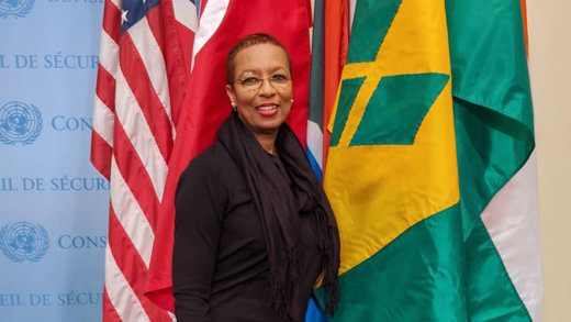 I. Rhonda King, SVG's Permanent Representative to the United Nations, poses with her country's flag after the installation event on Thursday. (Photo: SVG UN Mission/Facebook)