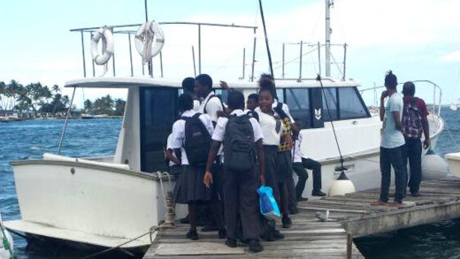 Mayreau students travel to secondary school by boat.
