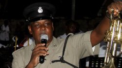 ASP Daniel Hall, head of the Police Force Band demonstrate an instrument at a Police Band concert in Layou on Dec. 21, 2017. Hall died on Tuesday, after a brief illness. (iWN photo) 