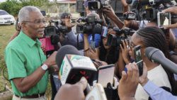 Guyana's incumbent President David Granger talks with journalists after Monday vote(Photo: National Unity and Alliance for Change Press Office/AFP)