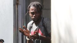 The accused, Kimron Neverson leaves the Serious Offences Court, on Thursday, for prison. (iWN photo)