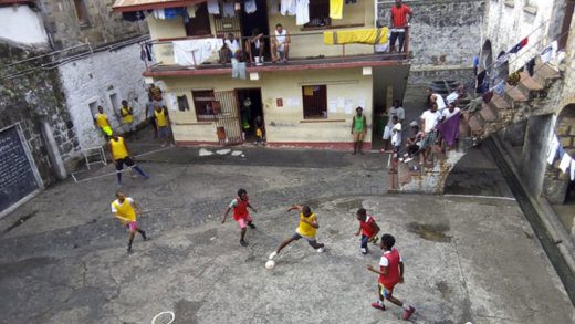 Action in the prison soccer competition.