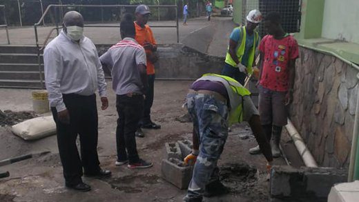 Minister of Education, Jimmy Prince, left, during a visit to the Kingstown Preparatory School on Tuesday, where work was being done in preparation of next Monday's reopening of schools. (Photo: Facebook/Jimmy Prince)