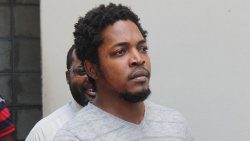 Novian Travis Vaughn Mullings is escorted back to prison to complete his sentence. (iWN photo)