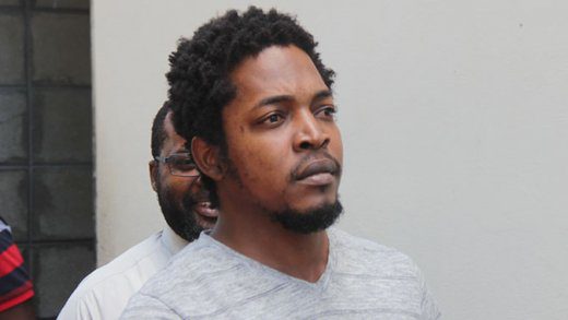 Novian Travis Vaughn Mullings is escorted back to prison to complete his sentence. (iWN photo)