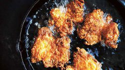 An internet photo of chicken being fried. 