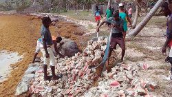 Amidst government inaction, residents had resorted to using boulders and conch shell in an effort to save Salt Whistle Bay. (Photo: Mayreau Regatta/Facebook)