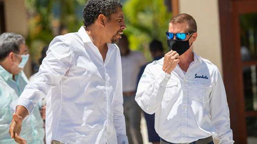 Minister of Finance, Camillo Gonsalves, left, and Adam Stewart, deputy chair of Sandal Resort International at Buccament Bay last week.  (Photo: Invest SVG/Facebook)