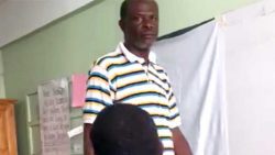 The registering officer, Vibert Pierre, captured in a video Exeter recording during the exchange last week.