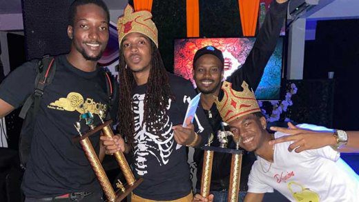 Steve Wallace, one of the organisers of the show, pose with winners in the competition, D'Fusion, right, and ChowMinister.