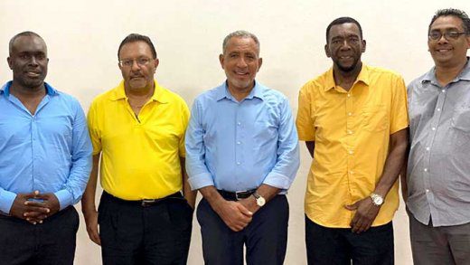 NDP leader, Godwin Friday, centre, poses with the party’s Marriaqua candidate, Bernard Wyllie, second from right, as well as, from left, Philip Jackson, Kirk Da Silva, and Curtis Bowman after last Thursday's candidate selection exercise. (Photo: NDP)