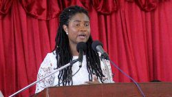 Shara Balcombe, daughter of Jerry S. George, pays tribute to him at his funeral in Kingstown on Saturday. (iWN photo)