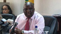 MInister of Education, St. Clair Jimmy PRince at Friday's press conference. (iWN photo)