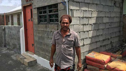 Joffre Christopher  outside the shop at the Kingstown Government School on Tuesday. (iWN photo) 