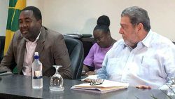Permanent Secretary in the Ministry of Education, Myccle Burke, left, and Prime Minister Ralph Gonsalves at Friday's press conference. (iWN photo) 