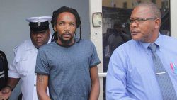 Polcie officers escort accused murderer Veron Bushay to prison on Tuesday. (iWN photo)