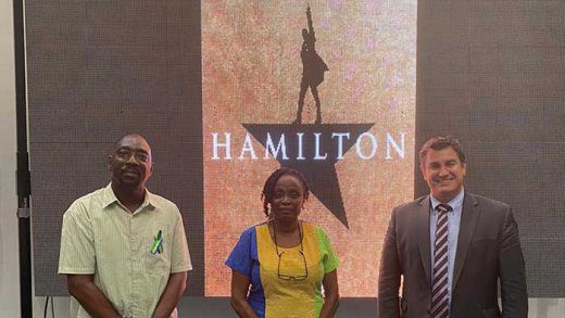 From left: Nigel Scott, Descima Alexander-Hamilton, and Larry Socha pause for a moment following the Hamilton screening.