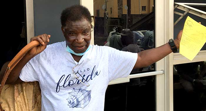 Quarantine-breaker Ivan Nathaniel Burgin, 78,  poses for journalists outside the Kingstown Magistrate's Court  after his arraignment on Thursday. (iWN photo)