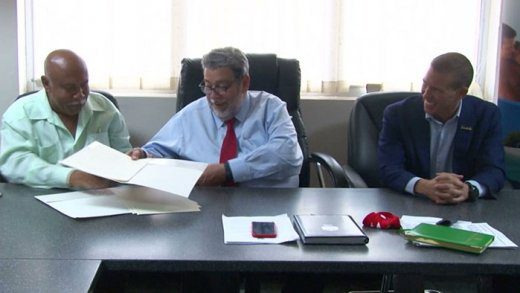 From Left, Minister of Tourism Cecil “Ces” McKie, Prime Minister Ralph Gonsalves, Adam Stewart, deputy chairman of Sandals. (Photo: API) 